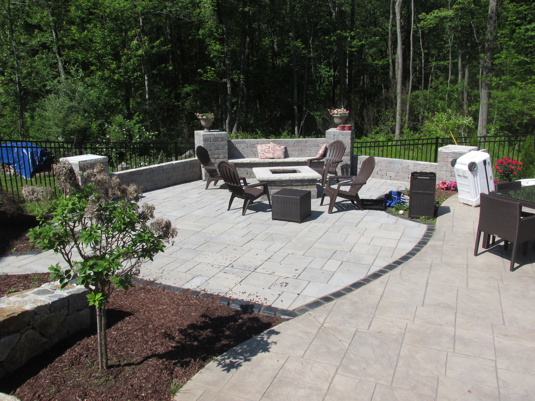Completed patio and sidewalk project with polished residential presentation